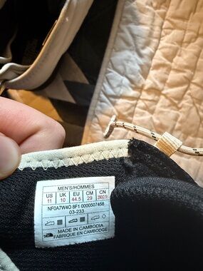 The North Face Cream and Black Puffer Slip-On Shoes